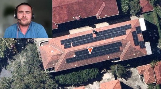 Apartment block with solar panels on roof