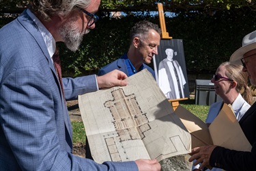 Professor Andrew Leach examines plans drawn by Leslie Wilkinson for a proposed project at St Michael's church