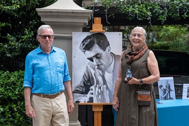 Peter Dadswell and Penelope Zylstra (Lyndon Dadswell's children) with a photo of their father.