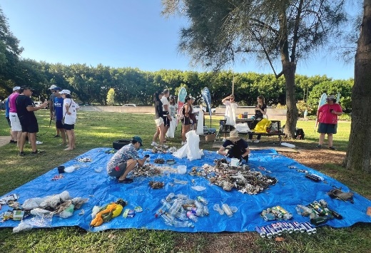 People cleaning up and sorting litter in reserve